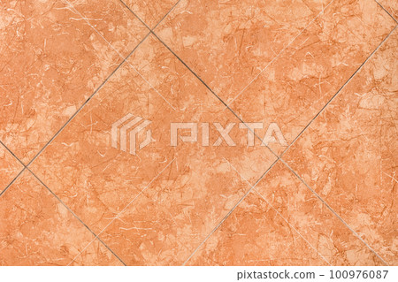 Orange brown ceramic floor tiles with abstract texture background pattern, top view Orange brown ceramic floor tiles with abstract texture background pattern, top view 100976087