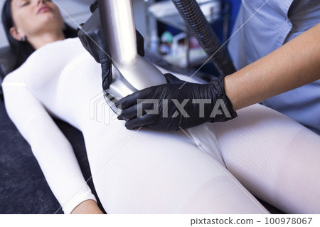 Close up of apparat procedure for weight loss. Lpg massage Close up of apparat procedure for weight loss. Lpg massage 100978067