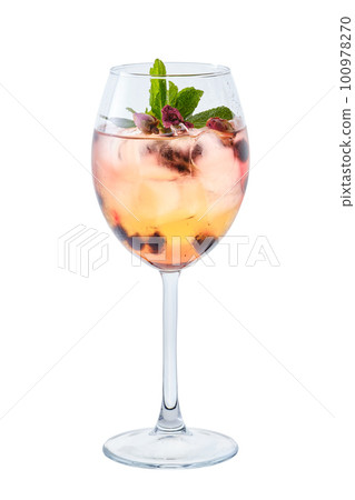 Cold white sangria with dry rosebuds in wine glass Cold white sangria with dry rosebuds in wine glass 100978270