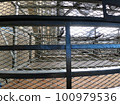 Large-scale condominium repairs from under the scaffolding 100979536