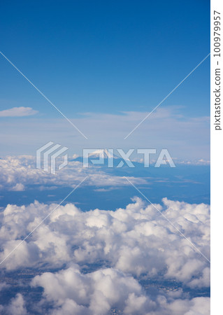 Sky, clouds and Mt. Fuji seen from an airplane Sky, clouds and Mt. Fuji seen from an airplane 100979957
