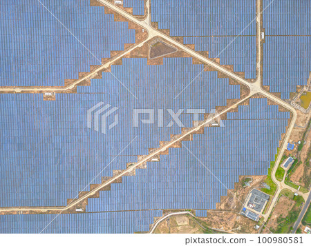 Solar cell panels at solar farm, drone view. Green energy concept. 100980581