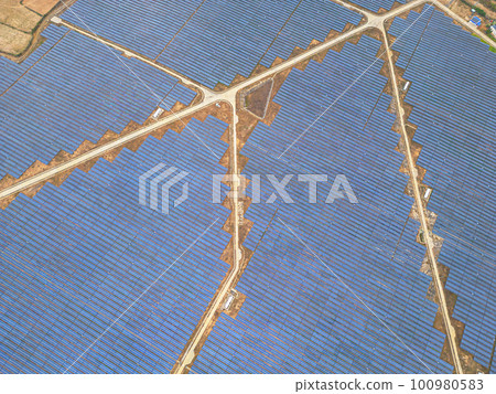 Solar cell panels at solar farm, drone view. Green energy concept. 100980583
