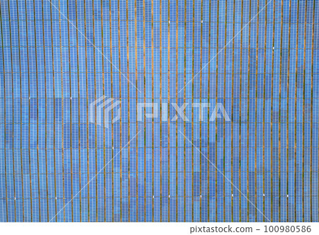 Solar cell panels at solar farm, drone view. Green energy concept. Solar cell panels at solar farm, drone view. Green energy concept. 100980586