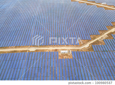 Solar cell panels at solar farm, drone view. Green energy concept. 100980587