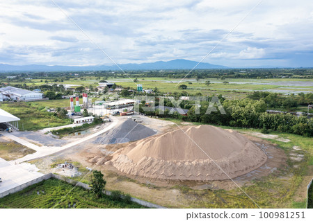 Pile of sand, gravel and concrete plant in aerial view. 100981251