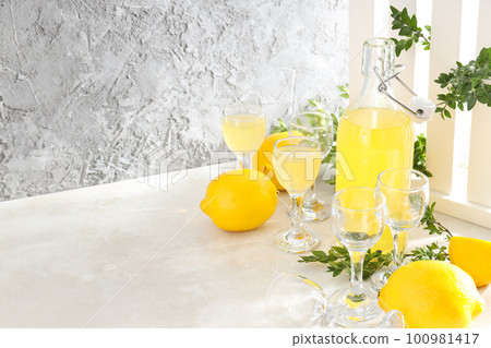 Concept of tasty drink, Limoncello, space for text Concept of tasty drink, Limoncello, space for text 100981417
