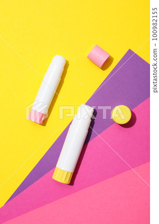 Concept of different office stationery with glue 100982155