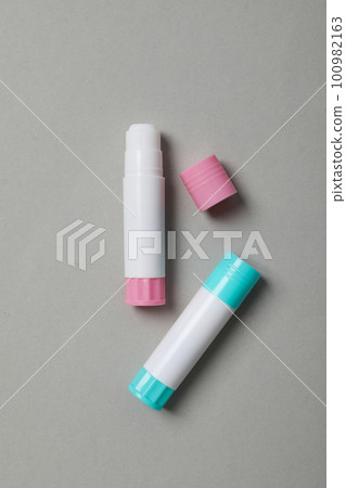 Concept of different office stationery with glue 100982163