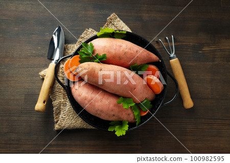 Concept of vegetables, sweet potato, top view 100982595