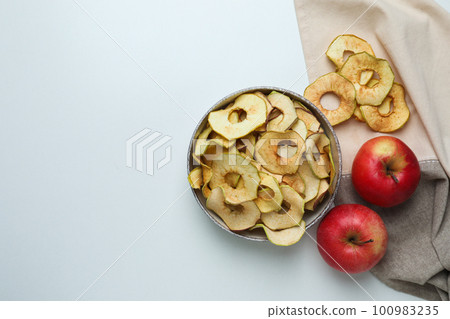 Concept of tasty food, dried apple chips, space for text 100983235