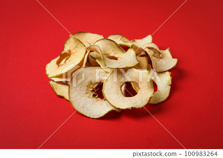 Concept of tasty food, dried apple chips 100983264