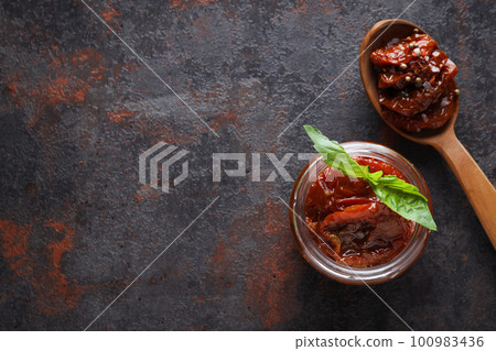 Concept of tasty food - sun-dried tomato, space for text Concept of tasty food - sun-dried tomato, space for text 100983436