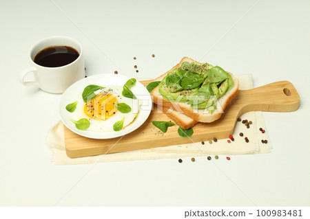Concept of tasty breakfast with delicious food on white background 100983481
