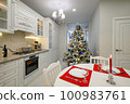 Interior of bright modern kitchen decorated for Christmas 100983761