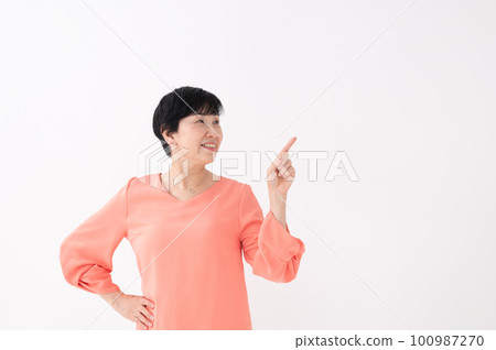 Pointing woman white background Pointing woman white background 100987270