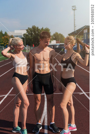 Group of athlete young women and man runnner Group of athlete young women and man runnner 100988052
