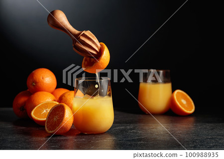 Orange juice is squeezed from fresh fruit. Orange juice is squeezed from fresh fruit. 100988935