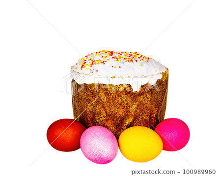 Easter bread and colored eggs on a white background. 100989960