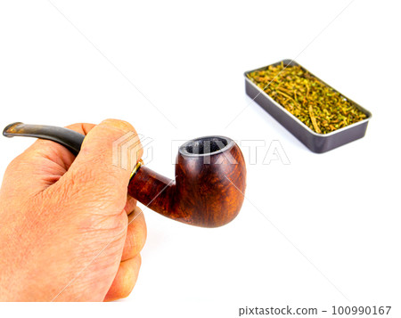 Pipe for smoking tobacco in the hand of a smoker on a white background. 100990167