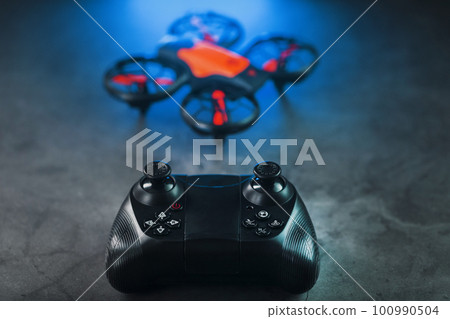 Quadcopter drone with joystick control and blue neon backlight Quadcopter drone with joystick control and blue neon backlight 100990504