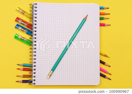 Stationery on a yellow background Stationery on a yellow background 100990967