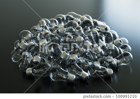Heap of used old fashioned light bulbs 100991210