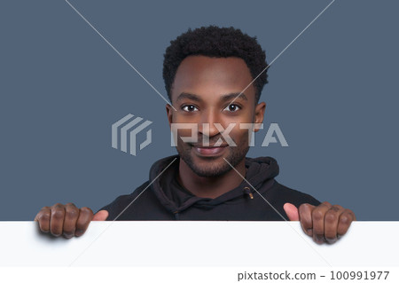 businessman advertising showing blank signboard over page holding white copy space board businessman advertising showing blank signboard over page holding white copy space board 100991977