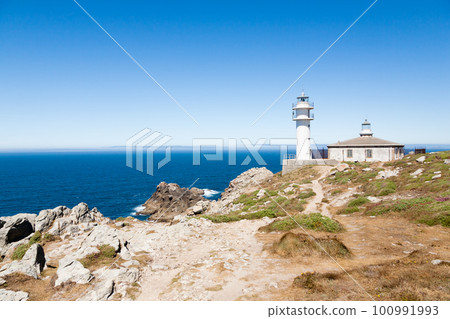 Tourinan lighthouse view, Galicia, Costa da Morte, Spain. Tourinan lighthouse view, Galicia, Costa da Morte, Spain. 100991993