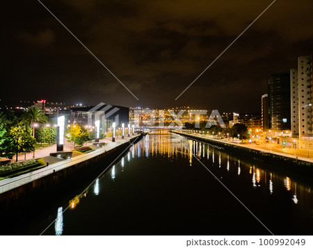 Bilbao night view. Nervion river perpective view, Spain Bilbao night view. Nervion river perpective view, Spain 100992049