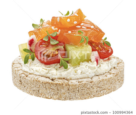 Puffed rice cake with smoked salmon isolated on white background Puffed rice cake with smoked salmon isolated on white background 100994364