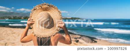 Summer beach vacation panoramic young woman with straw hat on Caribbean destination getaway sun holiday travel banner panorama 100997826