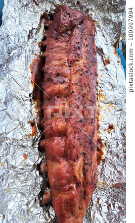 bbq ribs in aluminum ready to eat 100997994
