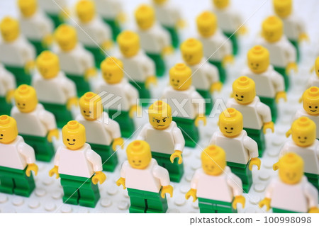 man wake up inside the  crowd of bald people and want to walk out 100998098
