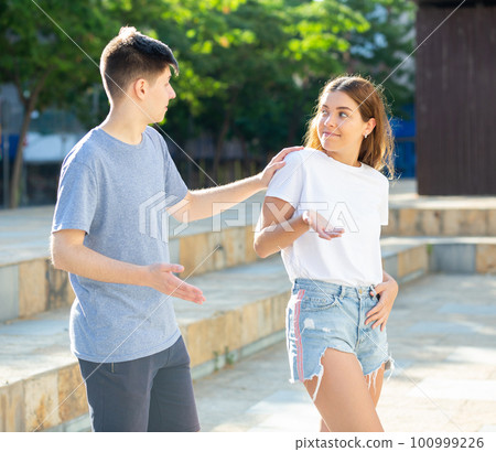 Guy is asking young lady out 100999226