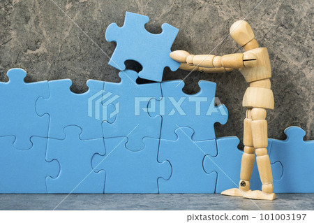 Dummy building blue puzzle. Creating or building own business concept. Dummy building blue puzzle. Creating or building own business concept. 101003197