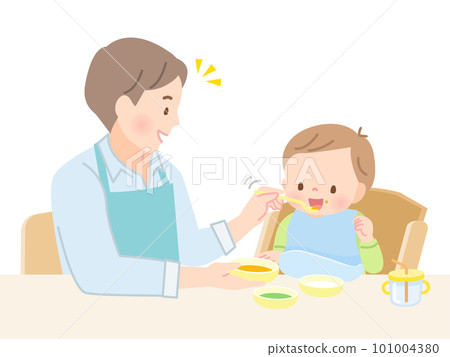 Dad feeding baby food 101004380