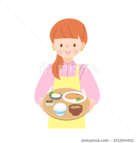 A young woman in an apron carrying a meal A young woman in an apron carrying a meal 101004402