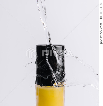 Bottle of shampoo splashing water and bubbles Bottle of shampoo splashing water and bubbles 101006418
