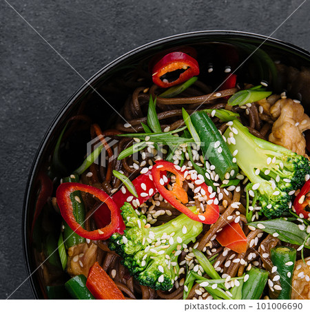 Traditional japanese noodles with vegetables in a plate Traditional japanese noodles with vegetables in a plate 101006690