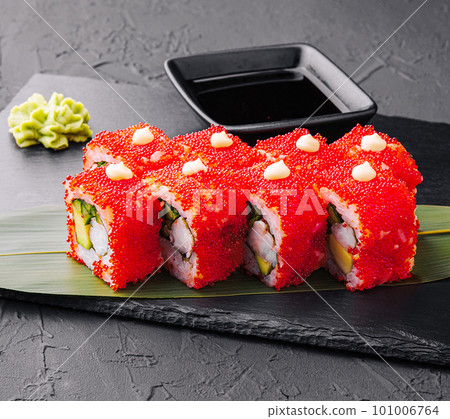 Sushi, rolls, California uramaki with tobiko caviar Sushi, rolls, California uramaki with tobiko caviar 101006764