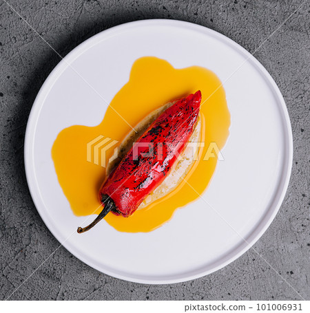 grilled peppers on a white plate grilled peppers on a white plate 101006931