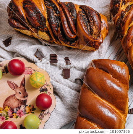 Easter eggs with buns on top view Easter eggs with buns on top view 101007366