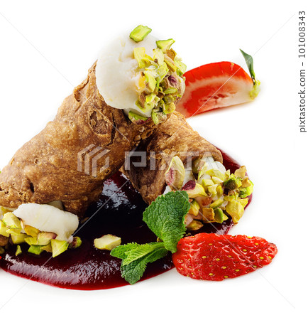 Cannoli italian cake with pistachios and strawberry jam 101008343