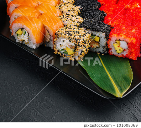 Big set of rolls on black tray 101008369