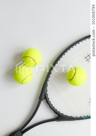Big tennis sports equipment, racket and balls, layout on a white background. Still life Sports. 101008794