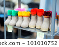Colorful handmade woolen felt boots sold on Easter market in Vilnius 101010752