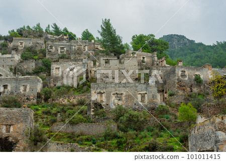 Abandoned Greek village in Turkey. Stone houses and ruins of Fethiye Kayakoy. Abandoned Greek village in Turkey. Stone houses and ruins of Fethiye Kayakoy. 101011415