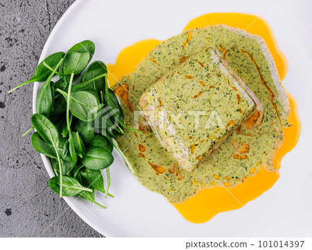 grilled tuna with walnut sauce and spinach 101014397