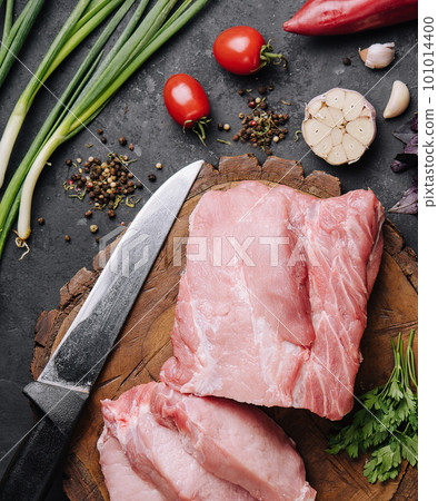 Raw pork neck meat cuts with spices 101014400